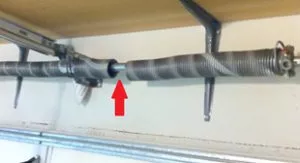 Le ressort de ma porte de garage est brisé. Que dois-je faire?